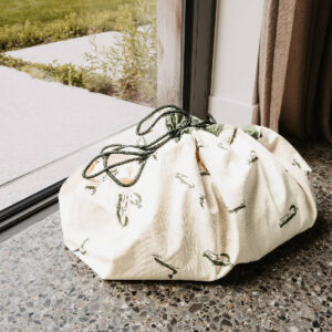 Play & Go Croco 2-in-1 speelkleed als opbergzak dichtgetrokken met koord