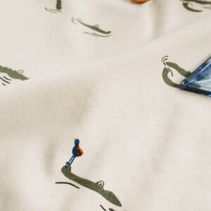 Detail van Play & Go Croco speelkleed met vriendelijke krokodillen en vogeltjes